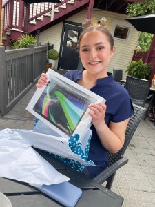 Youngest daughter with laptop gift for HS graduation