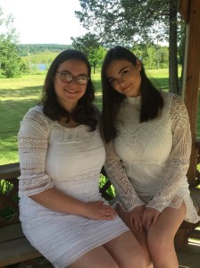 Author's daughters at their joint graduation party