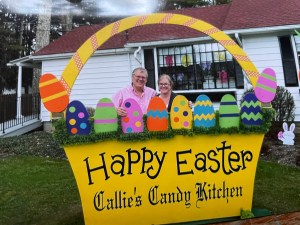 My husband and I visiting a candy kitchen for Easter treats