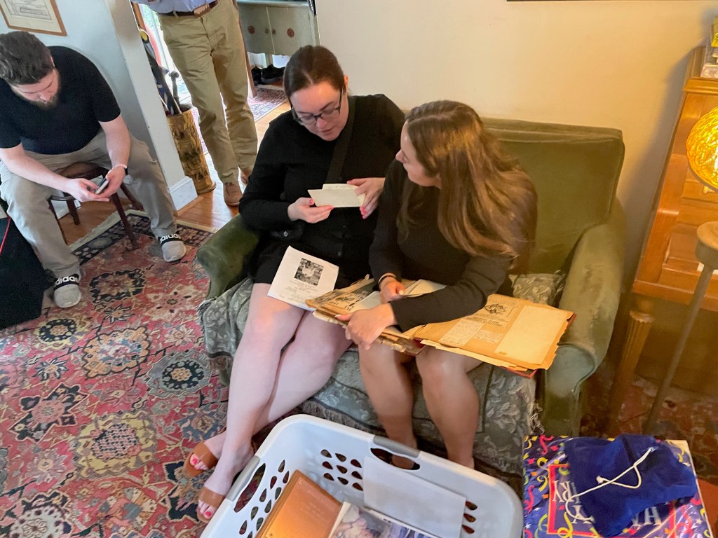 Looking at father's scrapbooks