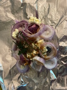 Fish and onions in foil packet