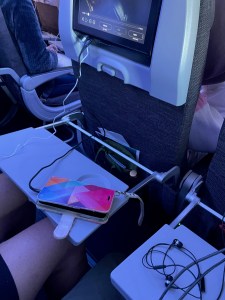 Watching a movie to keep calm on the plane