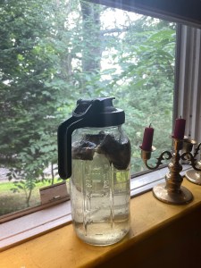 Ice tea brewing on window sill