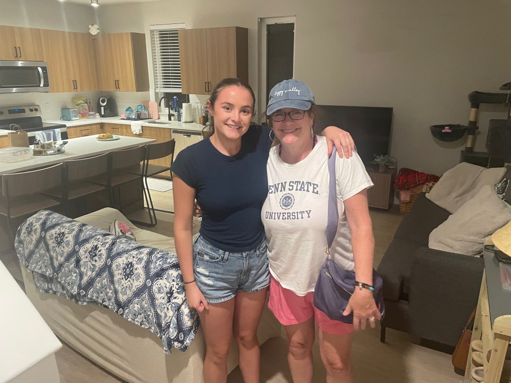 Author with daughter at new apartment