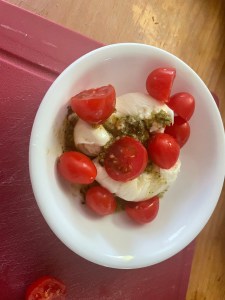 Burrata with pesto and tomatoes