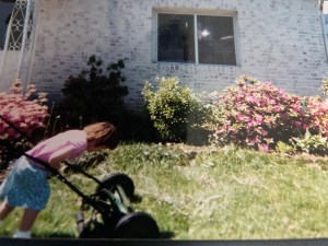 Mowing the grass-kids helping out